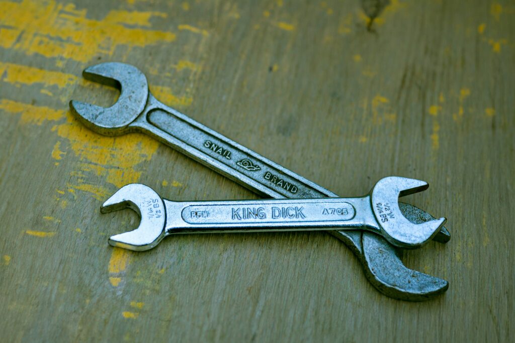 a pair of wrenches on a table