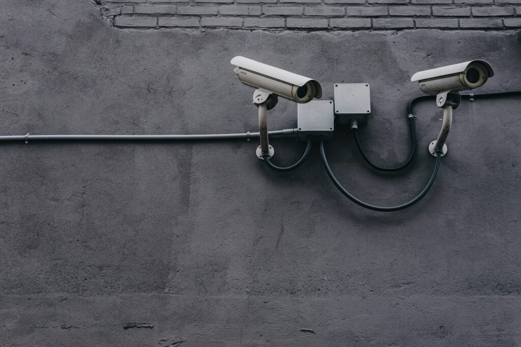 A wall with security cameras