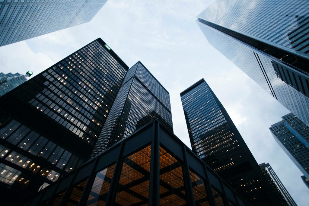 a view of tall skyscrapers in a downtown area